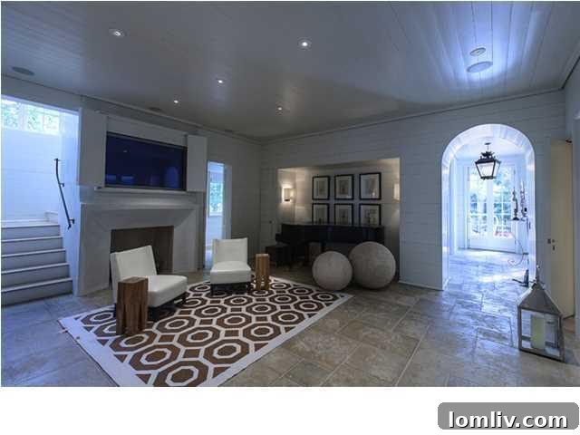 Spacious living area of a luxury beach home with elegant furnishings