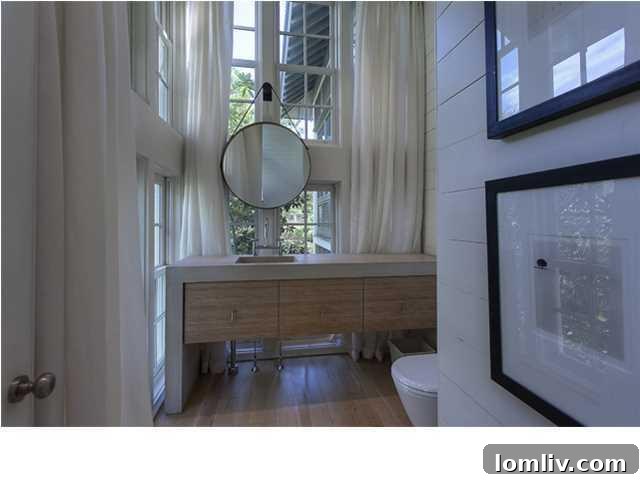Elegant master bathroom with a large soaking tub and dual vanities