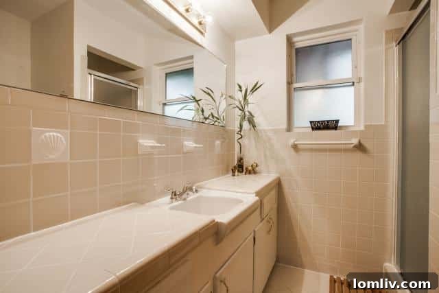 Casa Linda Forest's Coveted Address: The Tuesday Two Hundred, A Hip Family's Dream Home 7 Charming Master Bathroom with Pink Daltile at 8931 Stanwood