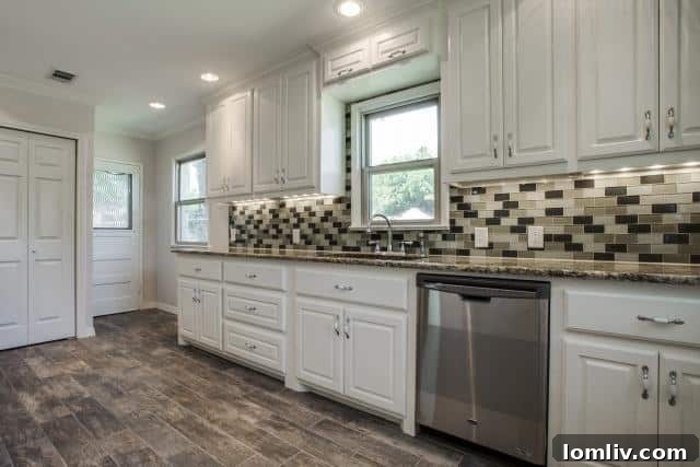 Wilshire Heights Darling: Perfectly Updated, Cozy & Move-in Ready 6 Stylish Kitchen Island with Seating and Mosaic Glass Backsplash