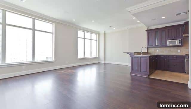 Spacious and elegant living room in Ritz-Carlton unit #904, showcasing sophisticated decor