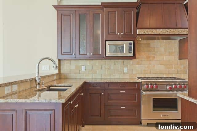 Second view of the luxurious kitchen in Ritz-Carlton Dallas unit #904, highlighting ample counter space