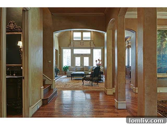 Sophisticated Foyer with High Ceilings and Modern Decor