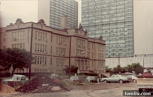 The historic Dallas High School building, a landmark structure in downtown Dallas awaiting redevelopment, symbolizing urban revitalization.