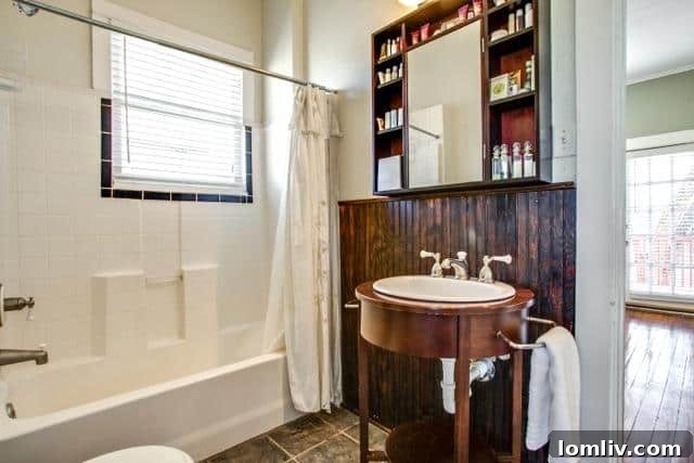 The second main house bathroom at 4826 Swiss Avenue, tastefully updated for comfort.
