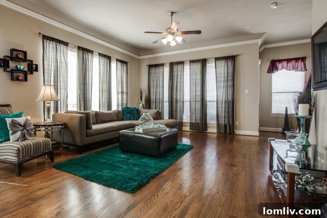 Spacious open-concept living area with ample natural light in a luxury Dallas townhome