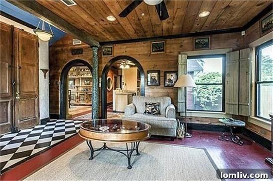 Living Area with French Doors and Arched Passageways