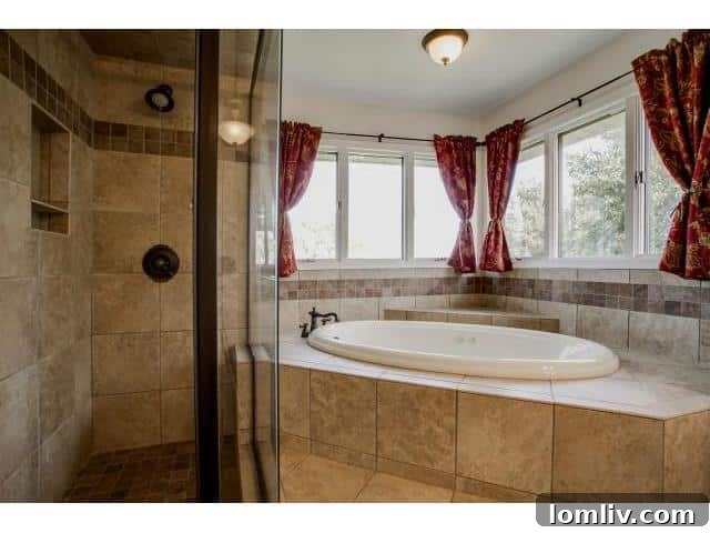 Spa Bathtub and Shower in Master Bathroom with Lake View