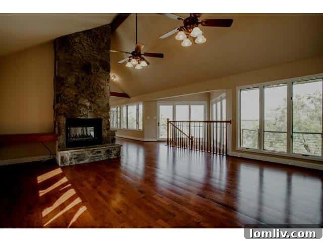 Spacious Living Room with Lake Views and Fireplace