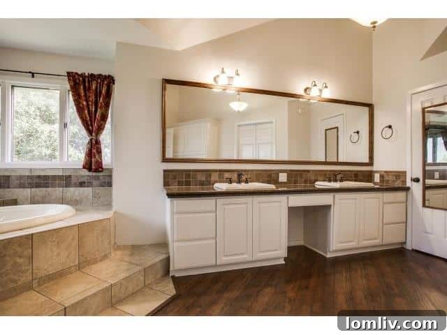 Master Bathroom with Dual Vanities and Large Windows