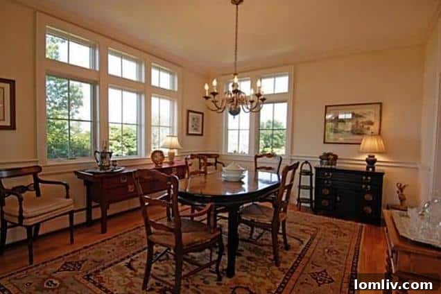 Elegant dining room with large windows in a Rockport, Maine estate