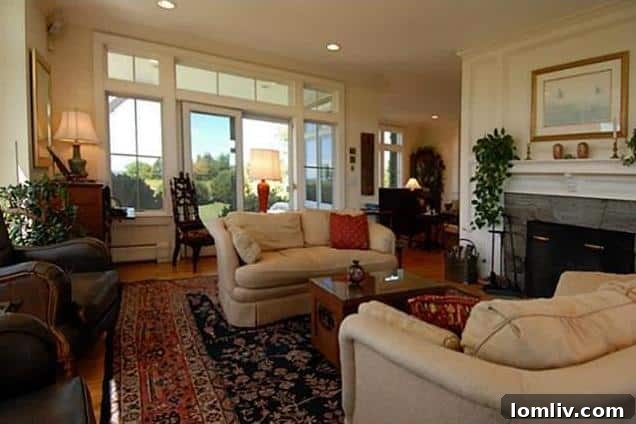 Luxurious living room with fireplace and scenic views in Rockport, Maine