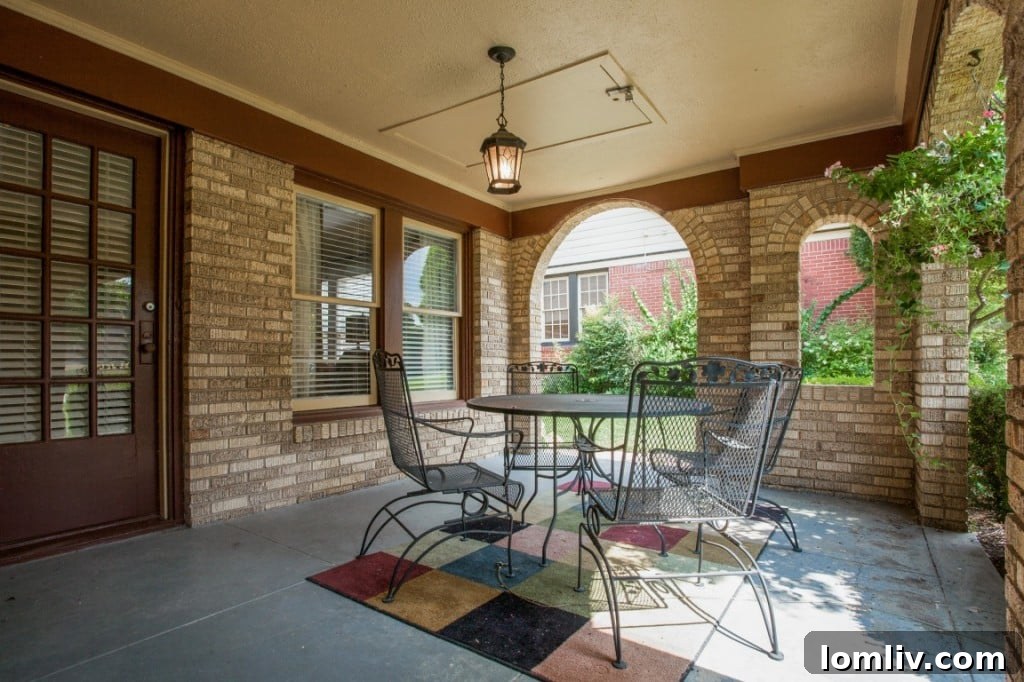 Front exterior view of 710 Monte Vista Dr, showcasing the Tudor architecture and well-maintained landscaping.