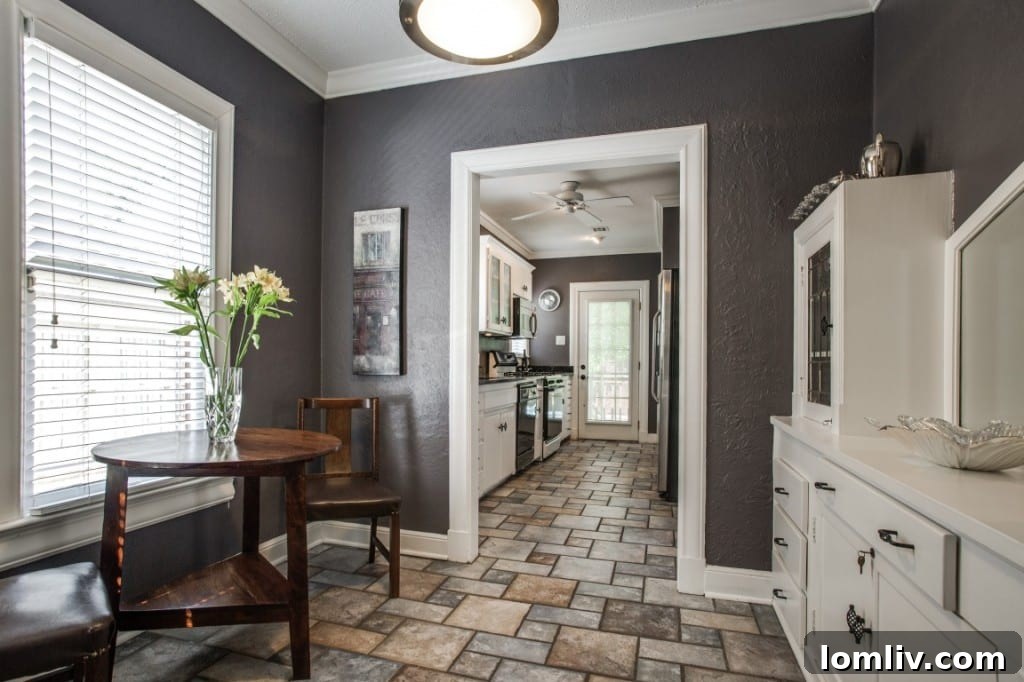 A bright bedroom with hardwood floors and ample natural light, showing the home's cozy living spaces.