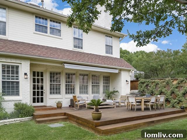 Outdoor teak deck with custom retractable awning, perfect for entertaining