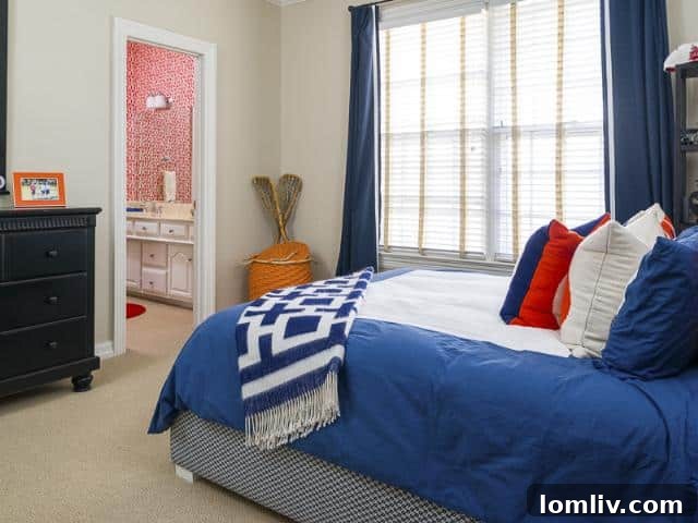 Another view of a tastefully decorated bedroom with ample space