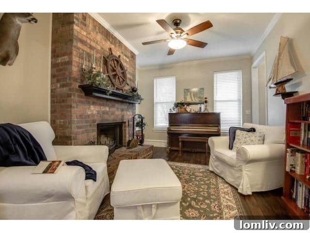 Formal living area showcasing elegant design and ample natural light in the Celina farmhouse