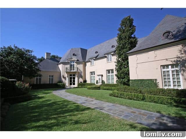 Chateau-style home with private ivy-covered courtyard at 3701 Maplewood Avenue, Highland Park