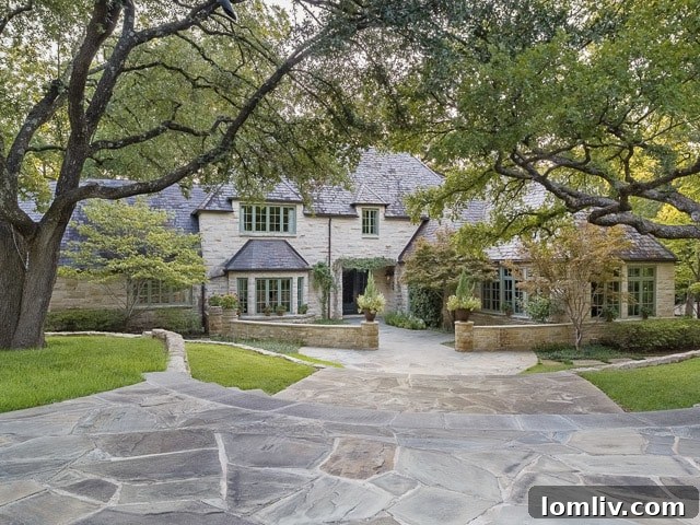 Grand front exterior of 4906 Park Lane, showcasing its Country French architecture