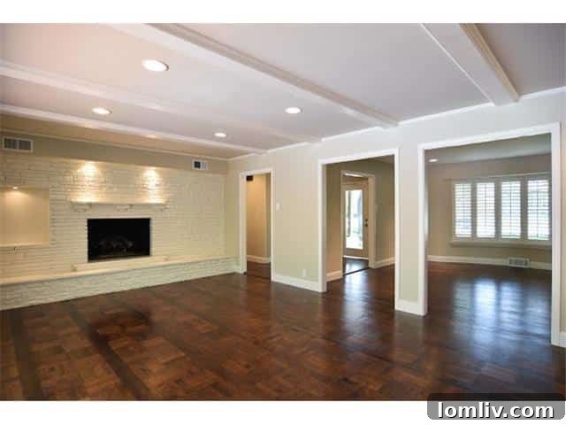 7031-Midbury-Living - Spacious Living Room with Hardwood Floors and Fireplace