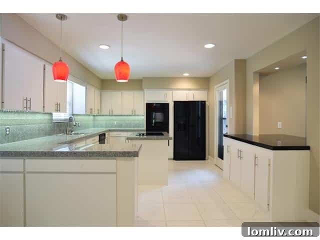 7031-Midbury-Kitchen - Contemporary Kitchen with Granite Counters and Island