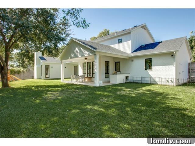 Spacious Backyard with Covered Patio and Lawn