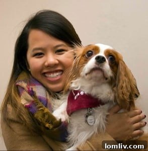Nina Pham embracing Bentley after his quarantine
