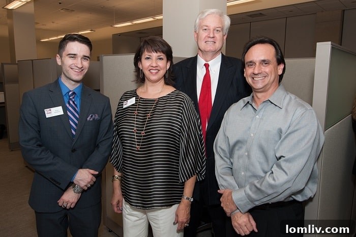 Ebby Unveils Stunning New Preston Center Office 3 Guests and executives mingling at the Ebby Halliday Preston Center office inauguration