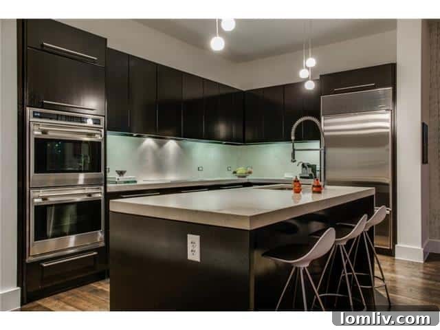 Modern kitchen with ample counter space at The House