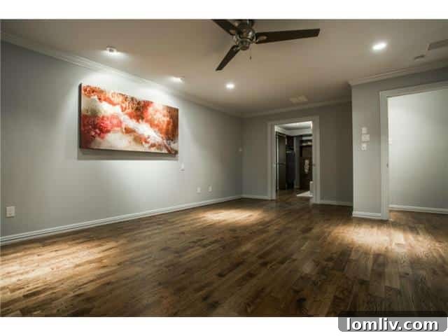 Spacious Master Bedroom with Elegant Hardwood Floors