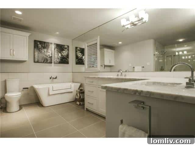 Spa-Like Master Bathroom with Soaking Tub and Elegant Finishes