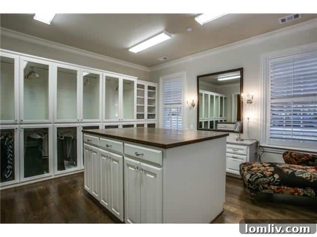 Enormous Master Closet with Desk and Chaise Lounge