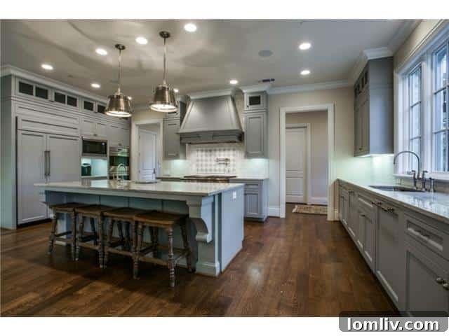 Gourmet Kitchen with Marble Counters and High-End Appliances