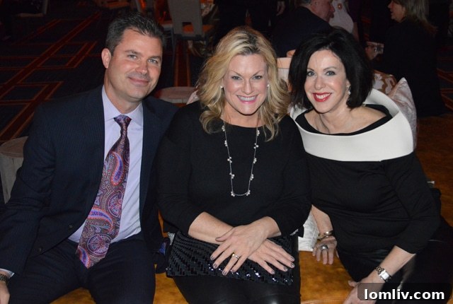 Dave Perry-Miller Realtor Chris LeLash with Jennifer LeLash and Susan Posnick at the hotel's grand reopening.