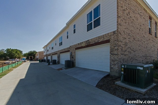 Rear Exterior and Two-Car Garage