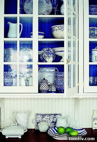 Kitchen with deep indigo blue cabinets as a striking accent color