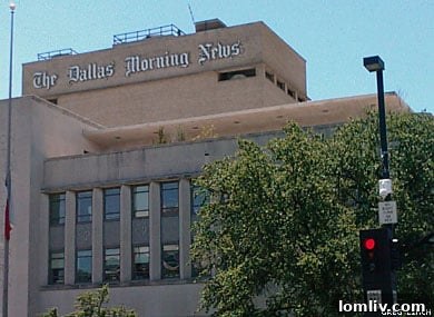 The impressive Dallas Morning News building, a symbol of traditional media embracing digital transformation.