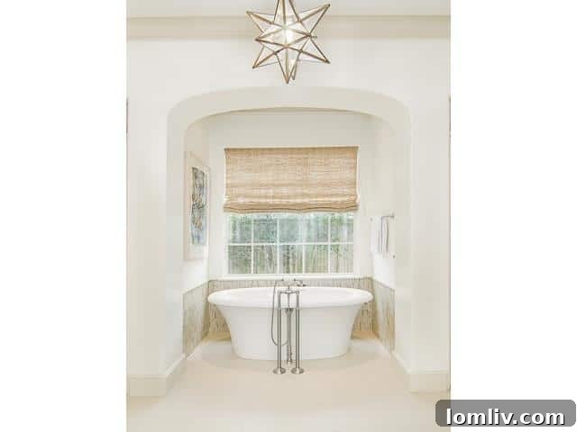 Opulent freestanding bathtub in the master bathroom at 4222 Manning Lane