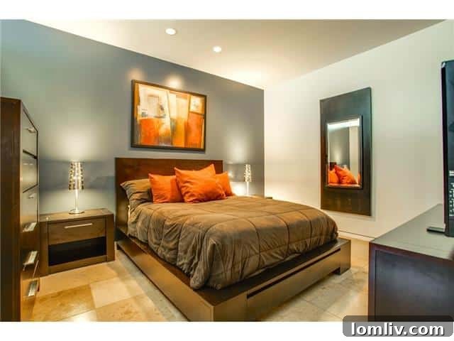 Luxurious master bedroom in The W Residences Unit 2001, featuring elegant decor and ample space.