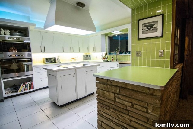 The beautifully renovated kitchen, blending midcentury style with modern appliances