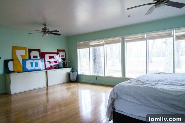 His-and-hers walk-in closets in the master suite, featuring natural light from skylights