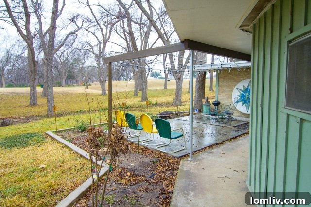 Spacious backyard deck overlooking The Golf Club of Dallas