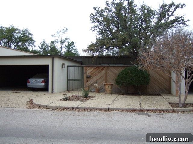 A residential street scene in Midland, Texas, showing a typical house facade