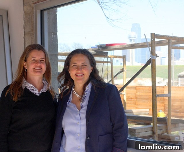 Val Haskell and Jenni Stolarski, standing proudly at the site of their future converted garage home, The Box