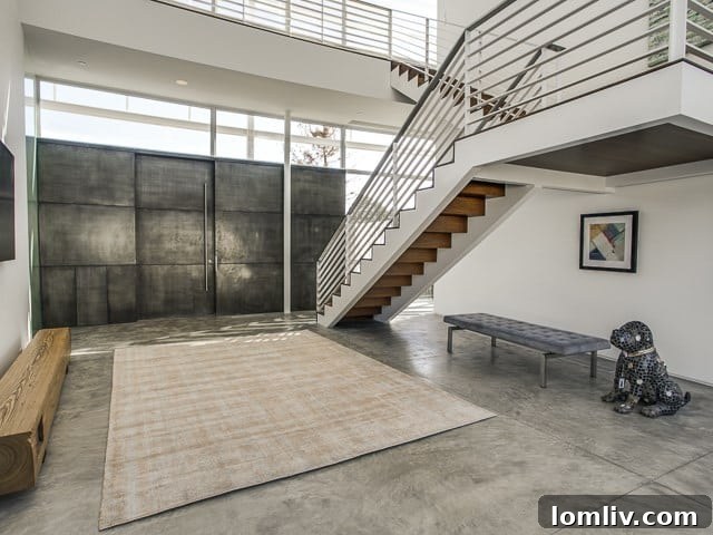 The striking modern front door of 6645 Northaven, emphasizing clean lines and architectural precision.