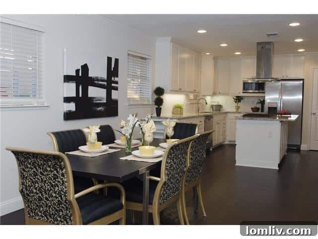 Modern Dining Area Leading to a Bright Kitchen with Island
