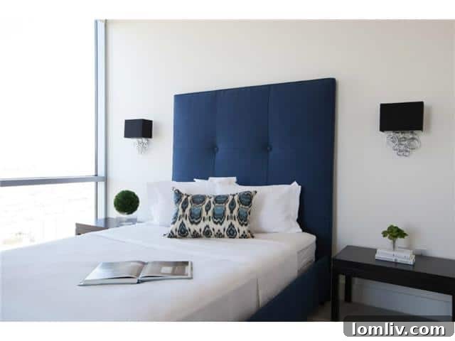 The House Master Bedroom - A luxurious and spacious master bedroom with contemporary decor and large windows.