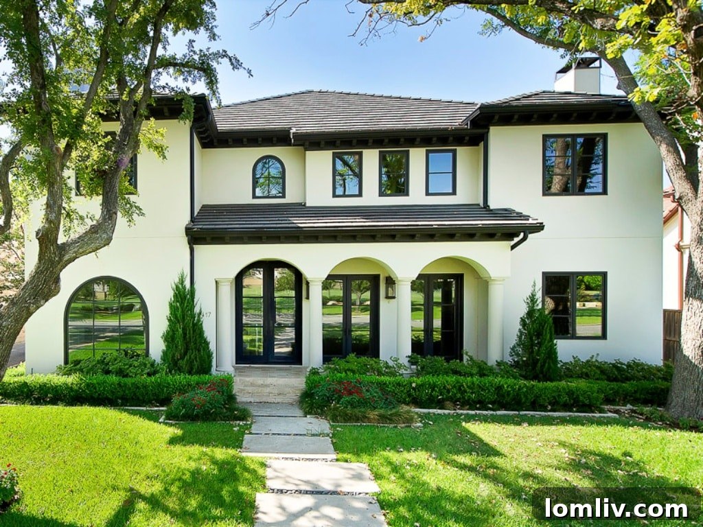 Stunning exterior view of a modern Texan home, showcasing architectural beauty and spacious design, reflecting the vibrant real estate market.