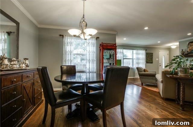 Midcentury Marvel: East Dallas Ranchette's Compact Power 7 Kitchen island with breakfast bar and ample storage