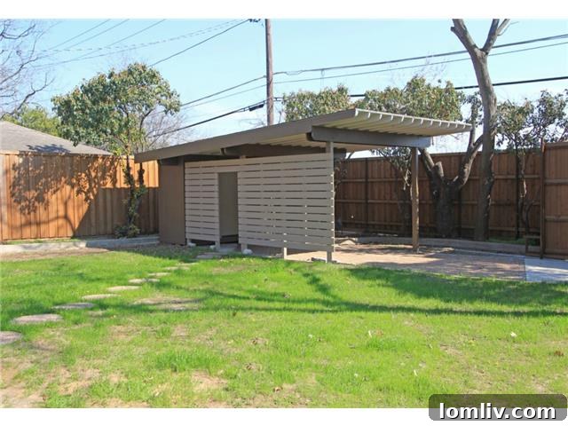 Stevens Park Stone-Clad Marvel: Inside Pure Divinity 18 2308-W.-Colorado-Rear-Car-Port - Convenient Rear-Access Carport with Storage